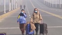 China permite a varias personas abandonar Hubei, una de las zonas más afectadas por el coronavirus