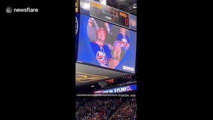 Man 'pulls a Jim' by faking proposal and tying shoes at hockey game