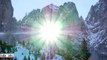 Le soleil transperce une montagne en suisse : images magnifiques