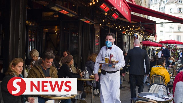 Paris reopens, eases back to normality