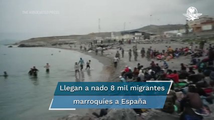 Migrantes se enfrentan contra la policía en su intento por llegar a Ceuta, en España