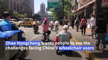 China wheelchair users dodge traffic on road to recognition