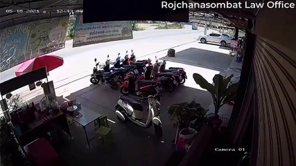 Sliding Car Smashes Through Shop Window