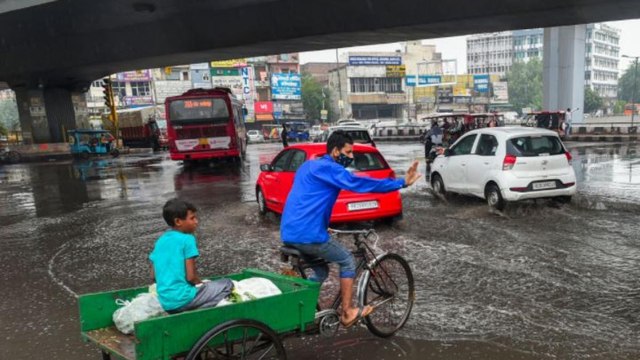 Delhi Rain: Truck falls into caved road in Najafgarh