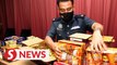 Johor Customs smells something fishy about lorry, finds 257,000 contraband smokes hidden inside