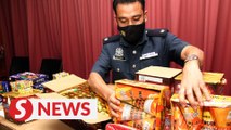 Johor Customs smells something fishy about lorry, finds 257,000 contraband smokes hidden inside