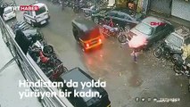 Hindistan’da fırtınada devrilen ağacın altında kalmaktan son anda kurtuldu