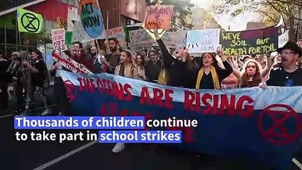 Australian school children cut class to renew climate protest
