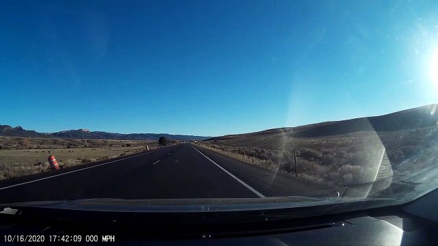 Car Swerves off Road to Dodge Truck Passing Semi