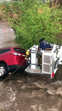 Portales Fire Department Saves Family From Car Swept by Floodwaters