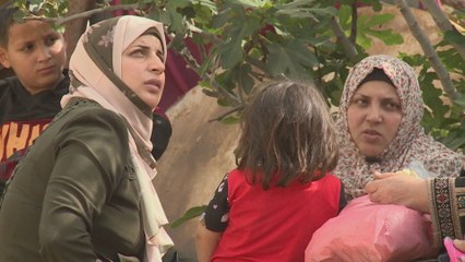 Families in Gaza return to their destroyed homes