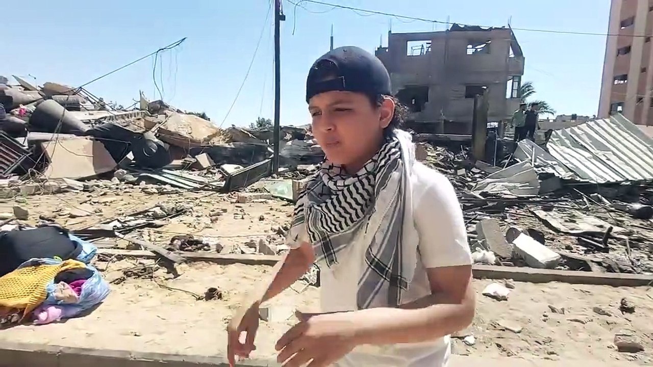 MC Abdul, 12-year-old Palestinian rapper, amid the bombing.