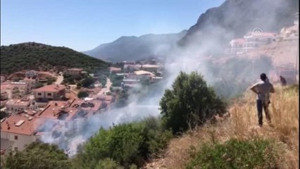 Kaş'ta makilik alanda çıkan yangın söndürüldü