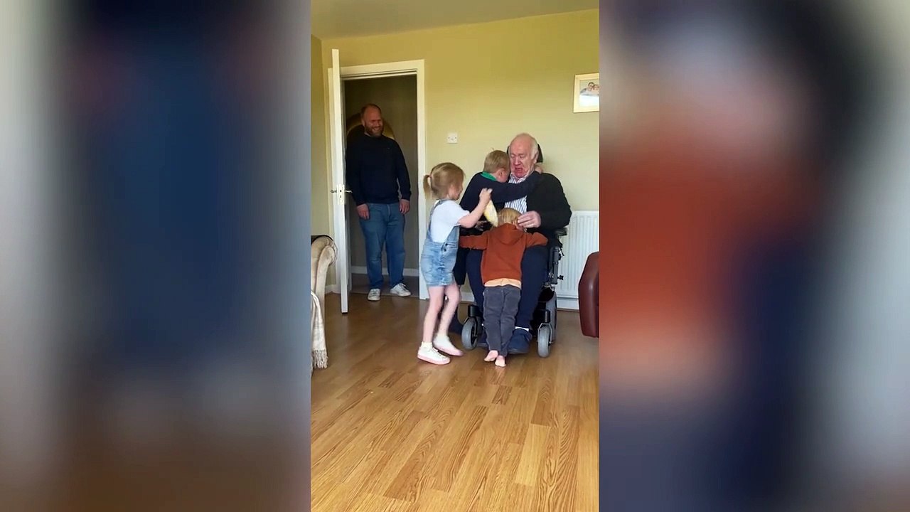 This is the tear-jerking moment a grandad was reunited with his grandchildren after seven months apart