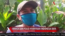 Warga dan Polisi di Simpang Lima Semarang Nyanyikan Indonesia Raya