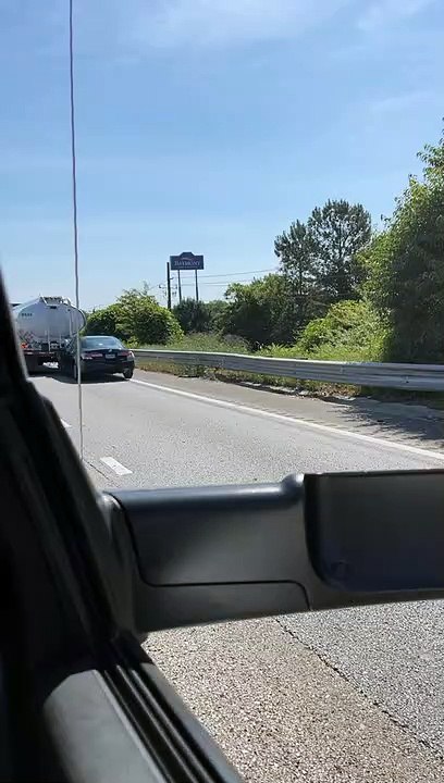 Tanker Drags Car Along Interstate