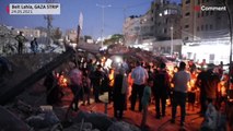 Palestinian children light candles during rally in northern Gaza