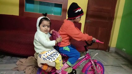 My baby boy and girl cycling