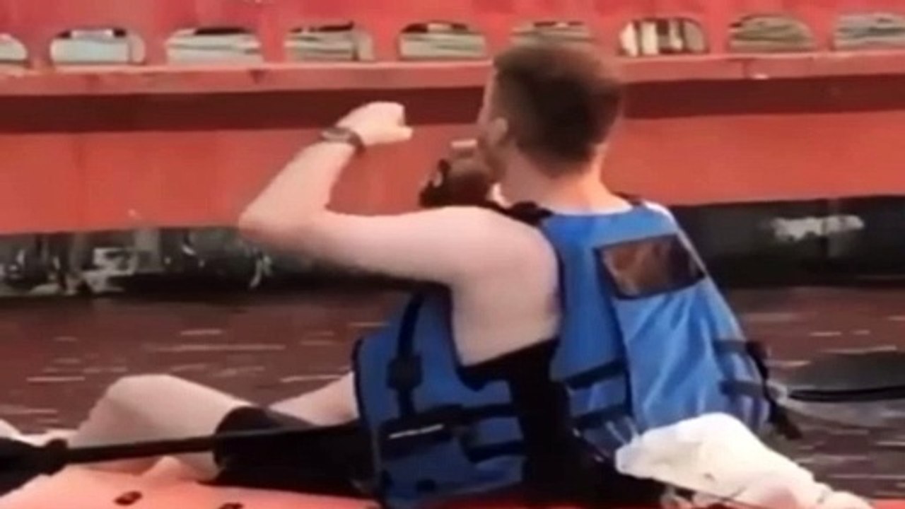 Laneway Festival: A kayaker downed a bottle of Jack Daniels and danced outside a music festival before he was interrupted by officers on a police boat