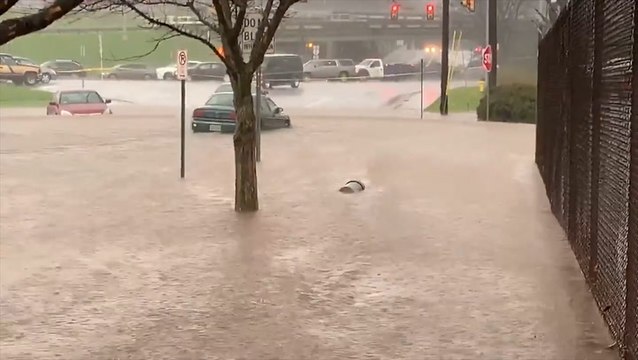 Devastating flooding submerges cars