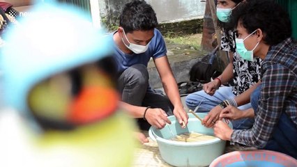 This young man is making reusable bamboo straws in Indonesia