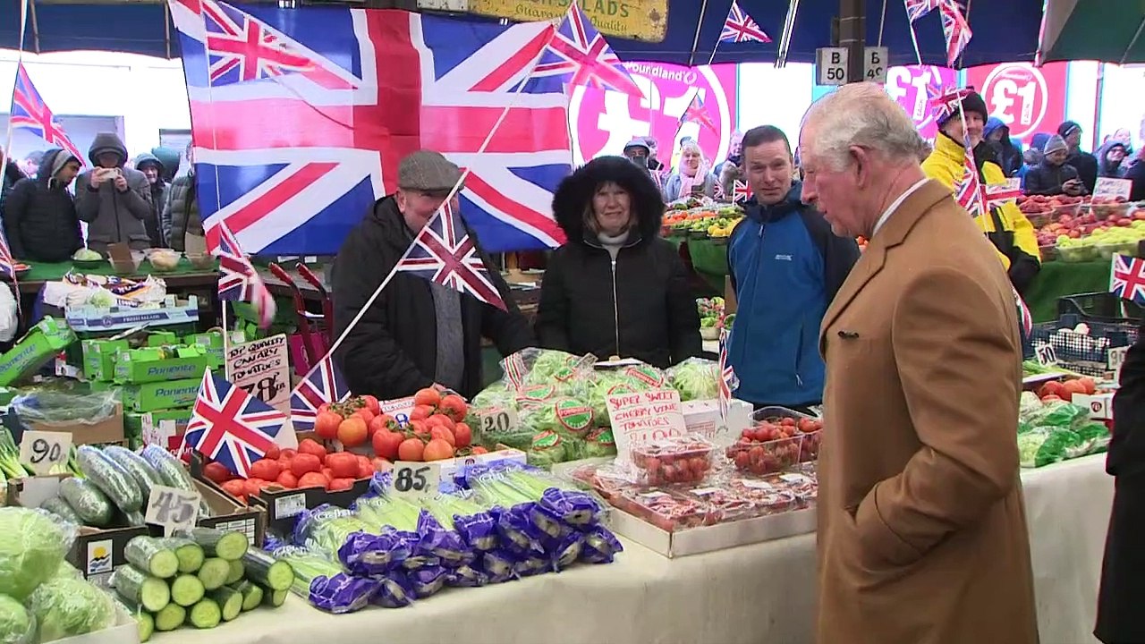 Prince of Wales and Duchess of Cornwall visit market