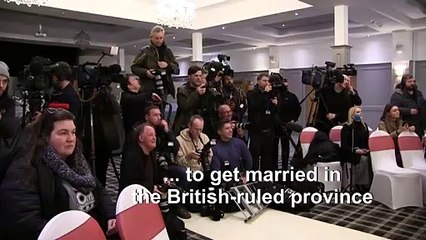 Couple make history with N.Ireland's first same-sex marriage