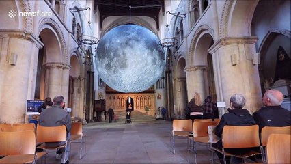 Otherworldly floating replica of the moon arrives at Rochester Cathedral, UK