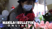 Where is the love? Virus fears dampen Valentine's Day in Shanghai