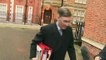 Rees-Mogg talks about the weather as he leaves home