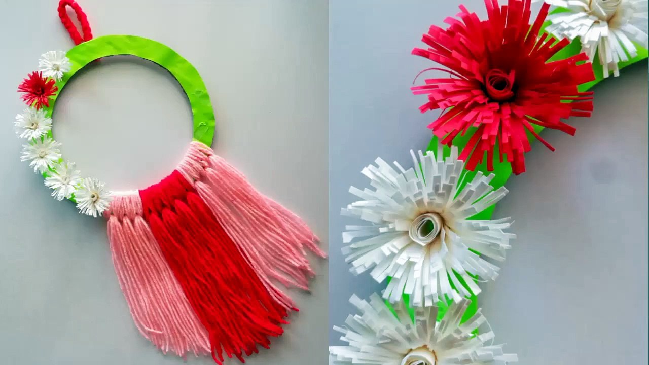 Diy paper flower and woolen wall hanging