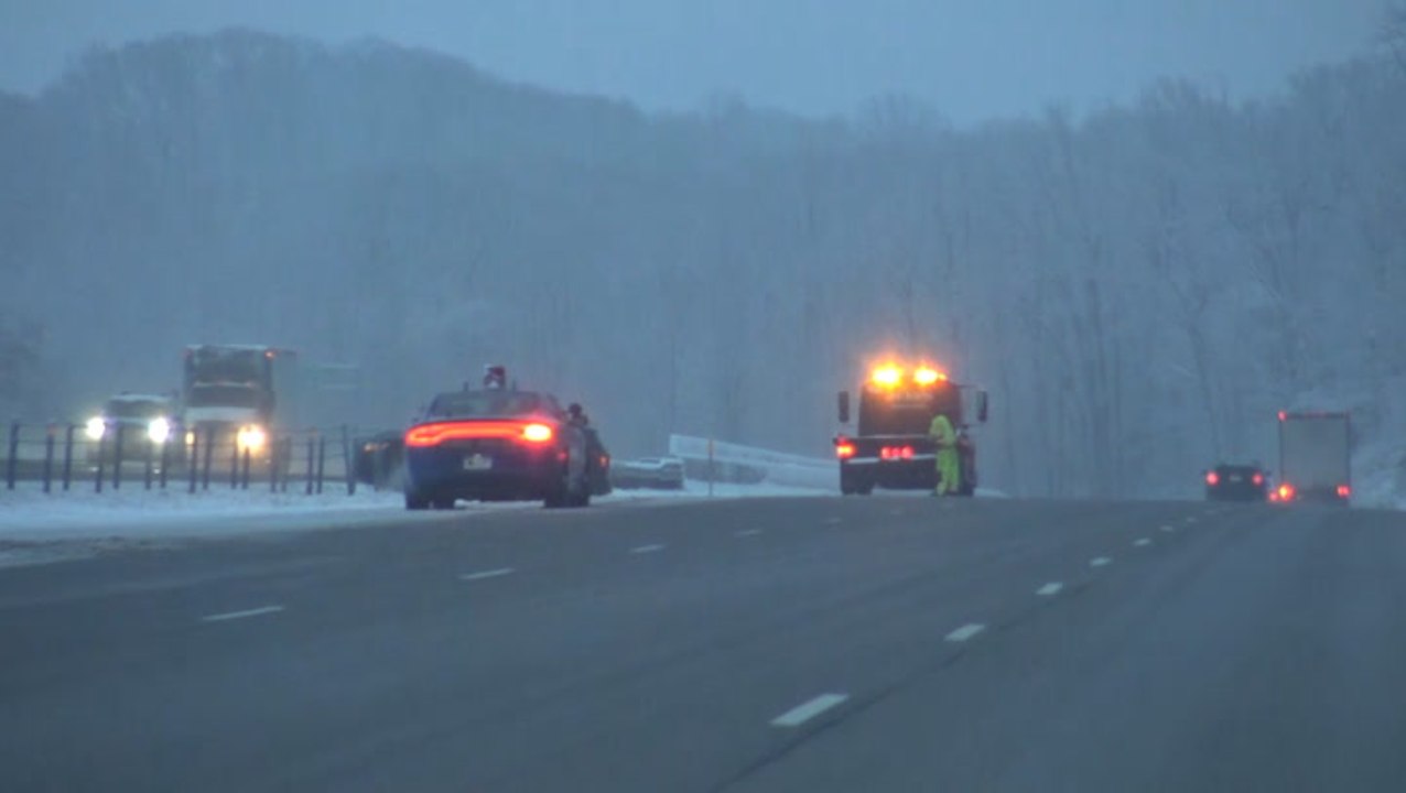 Car spins off road due to slippery conditions