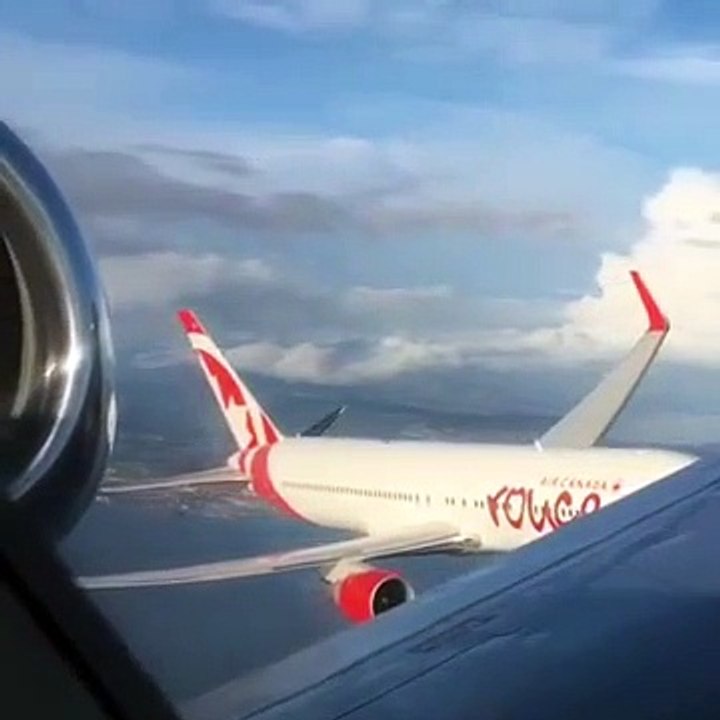 Ces 2 avions de ligne volent vraiment près l'un de l'autre