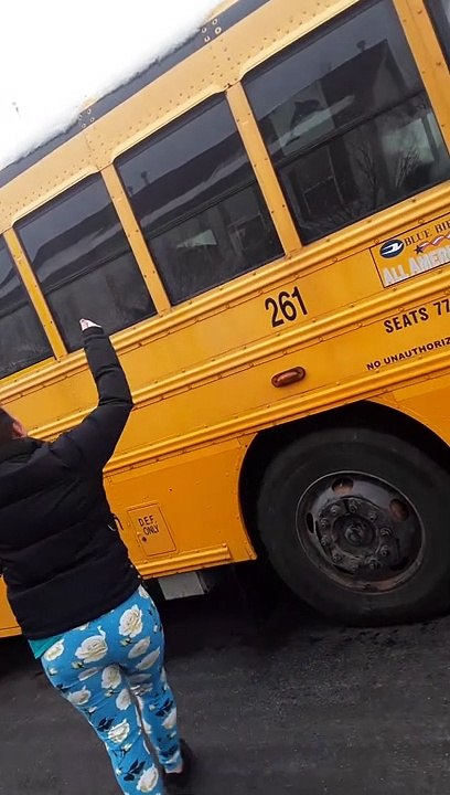 Children Being Held on Bus