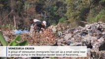 Venezuelan migrants in Brazil border town eat from garbage dump