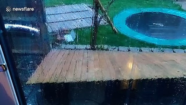 Storm Dennis repairs fence it blew down at UK home