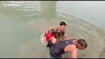 Brave soldier in India dives into river to rescue drowning woman