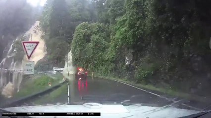 Raging Waterfalls Flood the Road