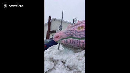 Massive dragon snow sculpture attracts attention in Newfoundland, Canada