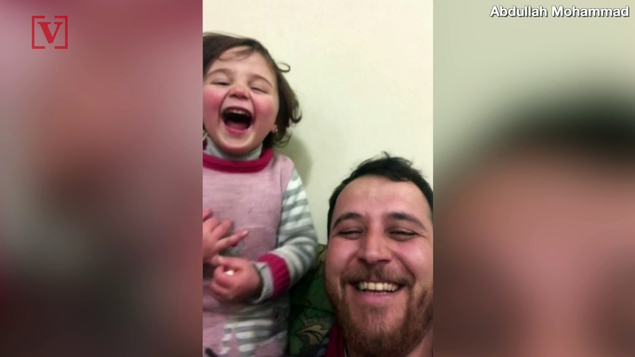 The Sweetest Giggle Ever: Syrian Dad Teaches Daughter to Laugh at Bombs to Cope with Fear