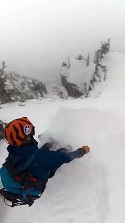 Man Uses Rockface to Avoid Avalanche