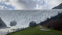 Gallons of water pours from overflowing Welsh dam after Storm Dennis rainfall