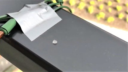 Hailstorm hits town during a sunny day