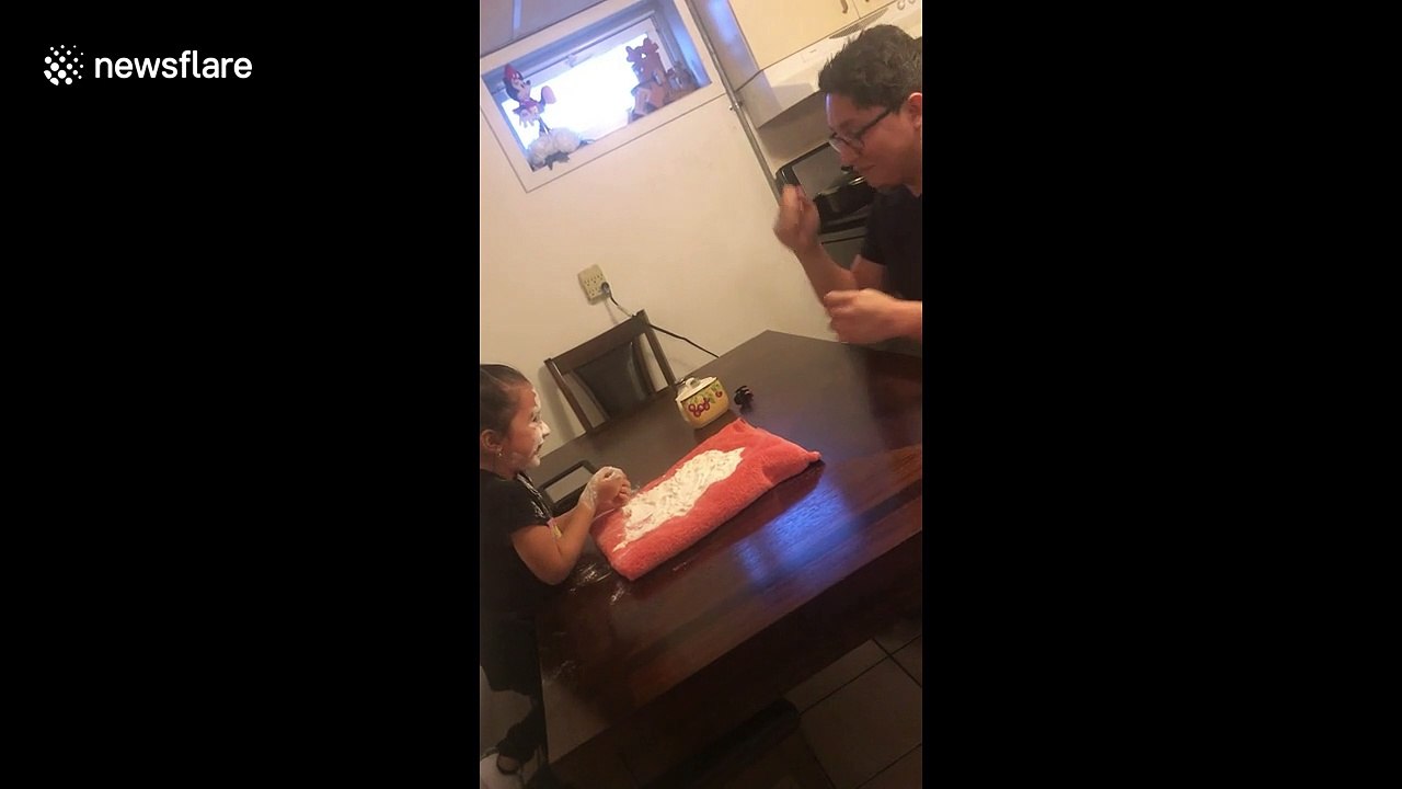 Rock, paper, scissors, flour? Father and daught...