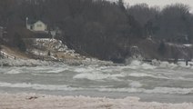 Fierce waves from Lake Michigan slam the shore