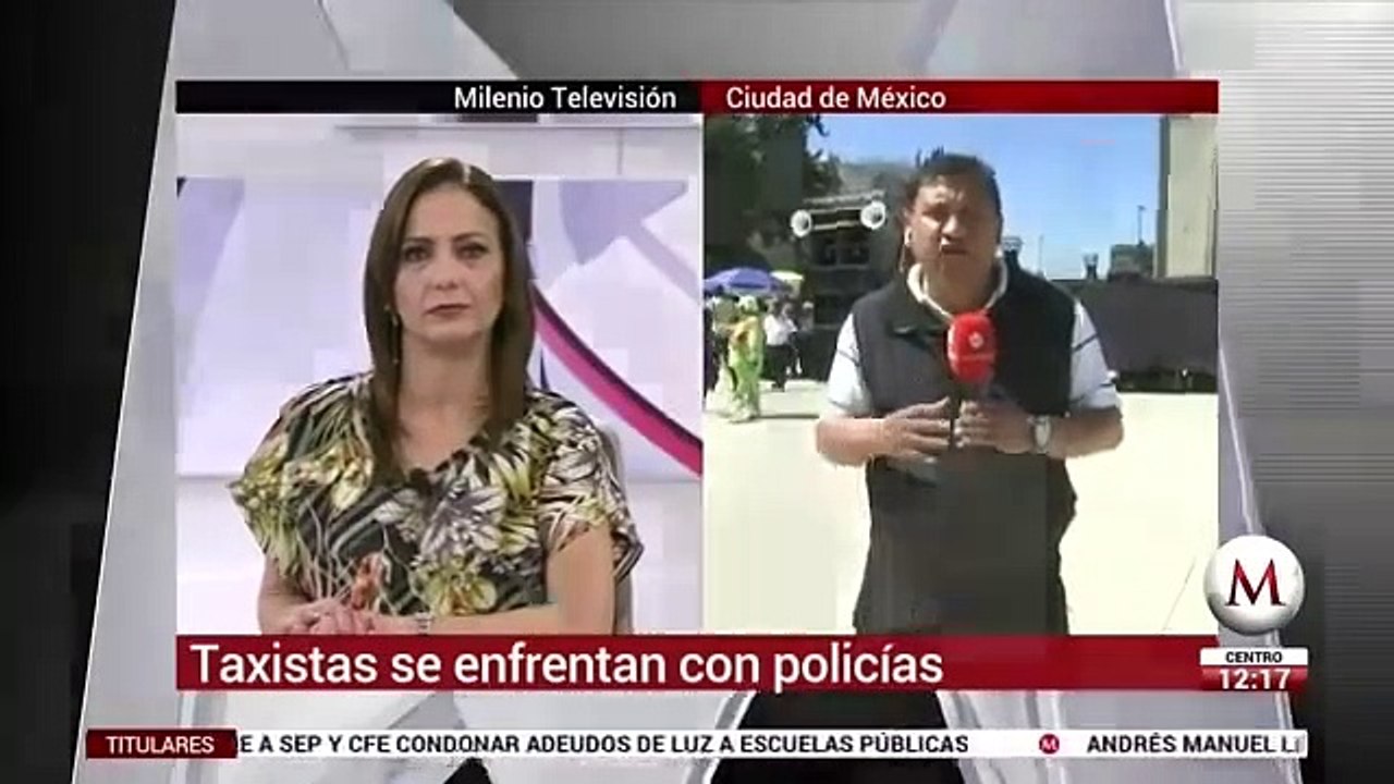 Con piedras, taxistas se enfrentan con policías en CdMx