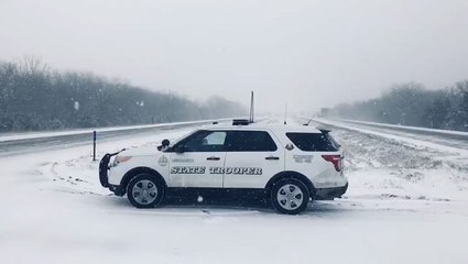 Road conditions snowy and poor