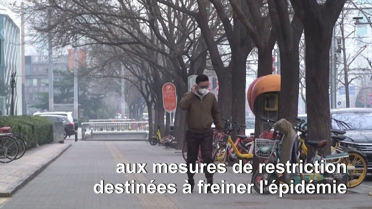Les Pékinois s'adaptent aux restrictions mises...