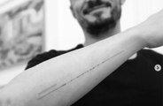 Orlando Bloom fixes his misspelled tattoo