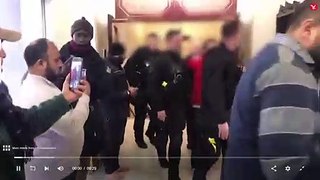 Footage from the scene showed a white male in a red hooded top being led from the mosque by police